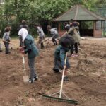 Children love being involved with grounds improvements